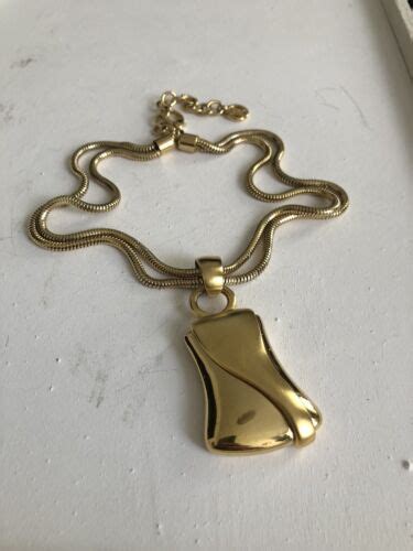 vintage givenchy paris new york silver snake chain necklace pendant